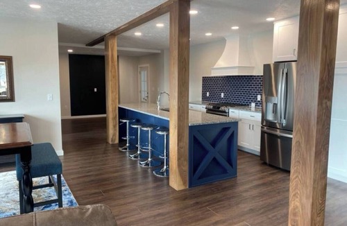 Escanaba House | Pristine Home Perfect for Family Bay Views Luxe Chef’s Kitchen Ludington Park