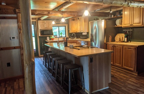 Dunbar Cabin | Private 3 BR 1.5 BA log cabin on 34 acres, driveway is 150' from trails