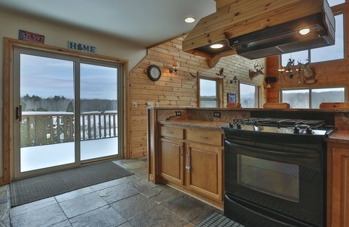 Comins Cabin | Private 50-Acre Northern MI Lodge. Walk to Golf & Fun Park. Trails Onsite