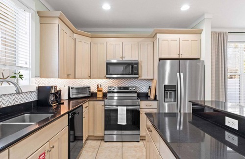 Emerald Waters Village House | Private Beach Access Gated Courtyard Pool Pet Friendly