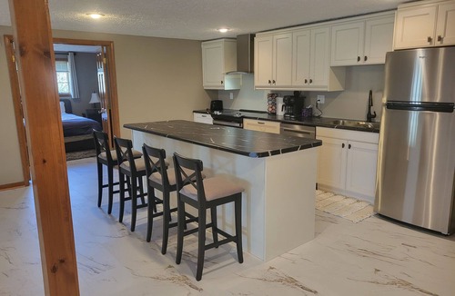 East Lansing Apartment | Private Luxury Suite with Hot Tub Near MSU & Hospitals