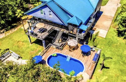 Gulfport House | Private Mini Resort! Pool, Hot Tub, Pool Table, on River, + more - Book Today!