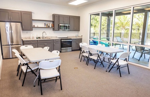 Oak RV Rental | Pull-thru RV Site #34 - Steps to Pool & Clubhouse