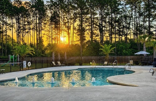Oak RV Rental | Pull-thru RV Site #34 - Steps to Pool & Clubhouse