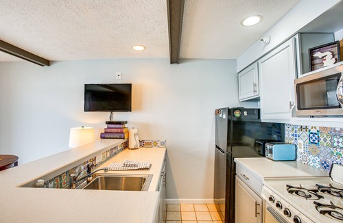 Onekama Condo | Quaint Onekama Condo: Walk to Portage Lake!