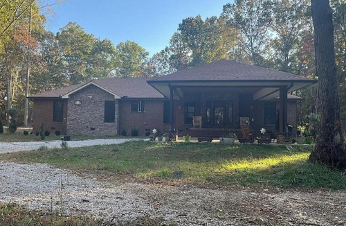 Tullahoma Villa | Quiet Forest Vacation home on a Private Road with Spacious Patios, Fire pit, Pet friendly and a Private pool
