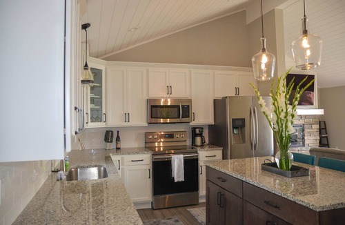 Rapid City House | Relax at our beautiful lakefront home on the southern end of Torch Lake.