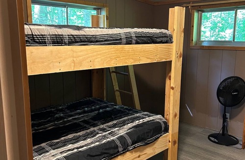Sand Creek Cottage | Rustic cabins in secluded campground with lake access and woods to wander in.
