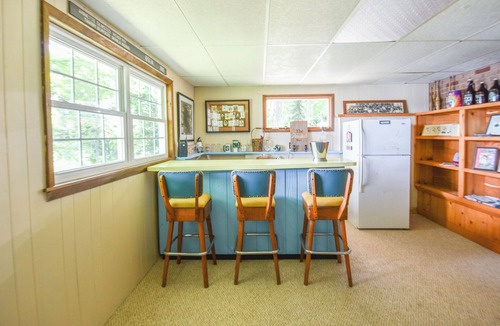 East Leroy House | Rustic Hills Retreat.a scenic home on beautiful lake front property.