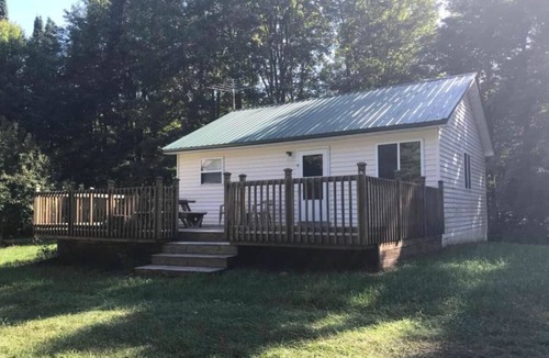 Rudyard Cabin | Secluded Deerfoot cabin getaway with WIFI near Trout Lake