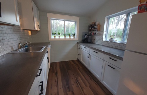 Barryton Cottage | Secluded Riverfront Cottage on the Chippewa with all the Modern Amenities