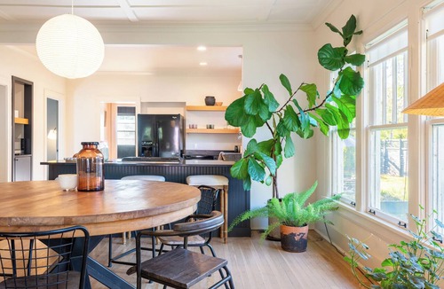 Eastwood Apartment | Southern Charm, Backyard Firepit, Mins to Downtown | Chapel House by AvantStay