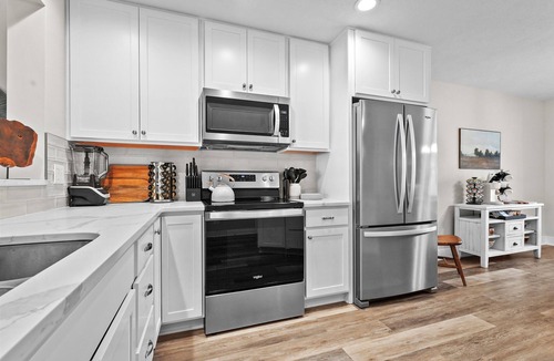 Houghton Lake House | Spacious 4-bedroom lakefront house with WiFi, AC in tranquil Houghton Lake