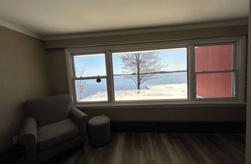Alpena House | Spacious 4-bedrooms lake front retreat in delightful Alpena area.