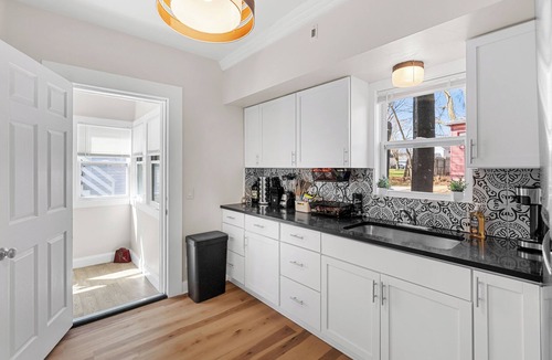 Lansing House | Spacious 4-bedrooms with 3 full showers, comfortable living room and dining