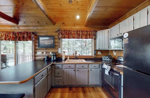 Presque Isle House | Spacious and beautiful lakefront log home on 7 acres with private dock