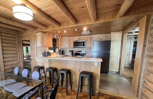 Interlochen House | Spacious log home on Green Lake. Waterfront. Dog ok.