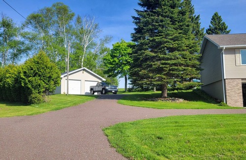 Hancock House | Spacious, pet-friendly home in Hancock Twp. Includes indoor sauna!