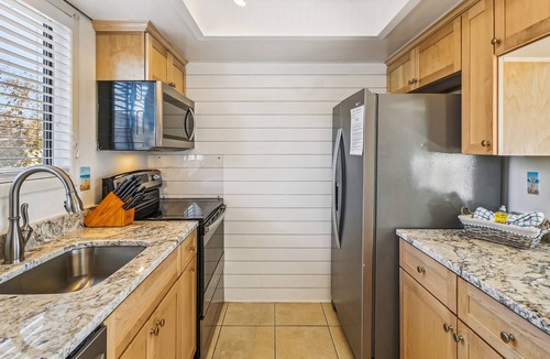 Holiday Isle Condo | SPC 2058 is a Beautiful 1 BR on the Golf Course at Sandpiper Cove by RedAwning