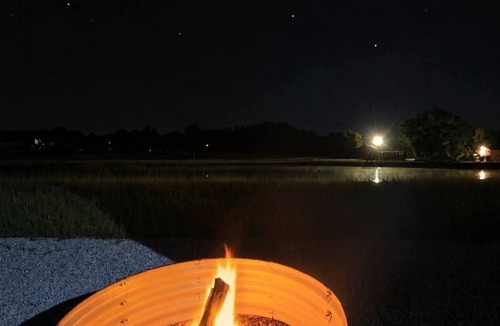 Winchester House | Stationary tiny camper in Winchester, TN with pond and mountain views.