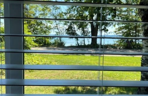 Suttons Bay House | STUNNING 100 FEET OF PRIVATE BEACH ON GRAND TRAVERSE BAY WITH HOT TUB