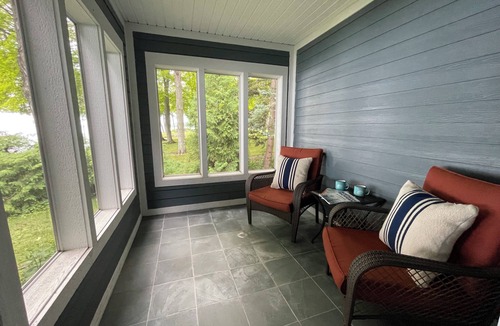 Suttons Bay Cottage | Stunning 150' ft footage on bay, 2 beachfront homes, 5 bedrooms & game room.