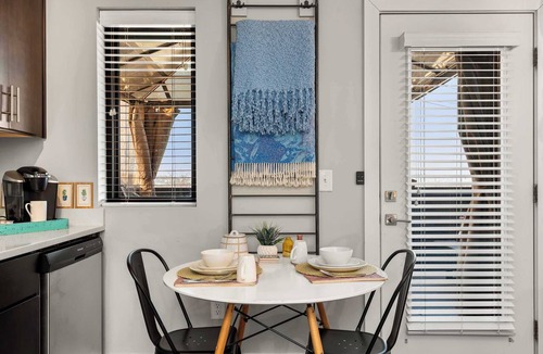 The Nations Apartment | Sunset Deck Studio Near Local Hot Spots