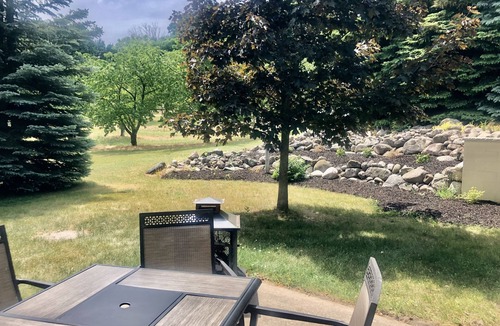 Suttons Bay House | Suttons Bay farmhouse-style home. Five bedrooms. Air conditioning. Dog okay