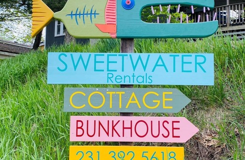 Ludington Cottage | Sweetwater Cottage is a well curated cottage a block away from Hamlin Lake
