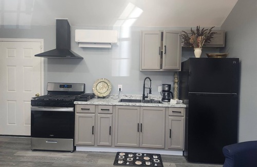 Evergreen House | This memorable cozy 2-bedroom Genesis Get Away house is a Peaceful Escape.