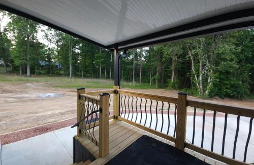 Phenix City House | Tiny Home with Grill Laundry Deck Desk