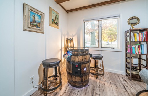 South Haven Cottage | Unwind in Riverfront Comfort — Hot Tub, Fire Pit, Boat Slip, Kayaks