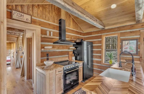 Nunnelly Cabin | Waterfront Designer Cabin w/Dock, Decks, Hot tub and Fire Pits.