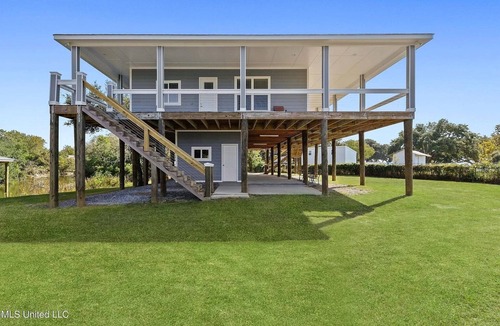 Kreole Cottage | Waterfront Home 3BD/4BA 2 Boat Docks Hot Tub Peaceful Retreat with Amazing Views
