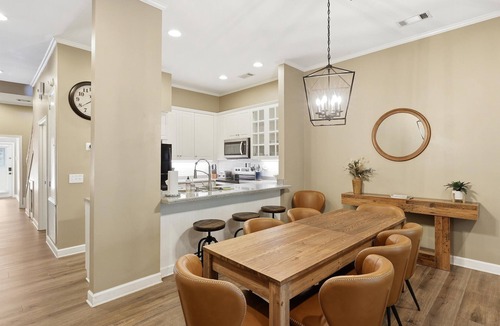 Jacksons' Gap House | Waterfront Lake Martin townhome sleeping 10. Features 2 king suites with private baths, a bunk room for 6, boat slip, dock access, boat ramp, 2 kayaks, and a screened porch. Just 30 miles from Auburn.