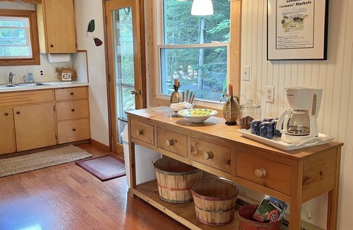 Lake Leelanau Cottage | Waterfront, peaceful, cozy, cottage w/dock amazing sunsets, kayaks,3 bed/2 bath.
