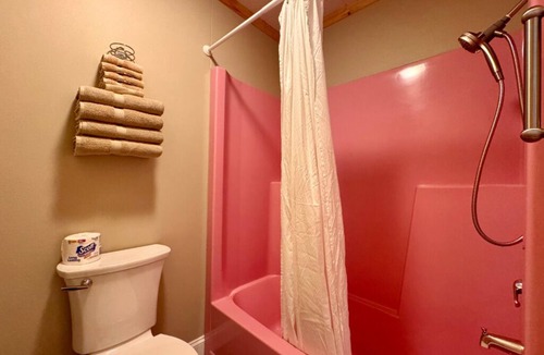 Trout Lake Hotel | Welcoming King Room #6 with AC at lakefront Twin Cedars Resort in Trout Lake MI