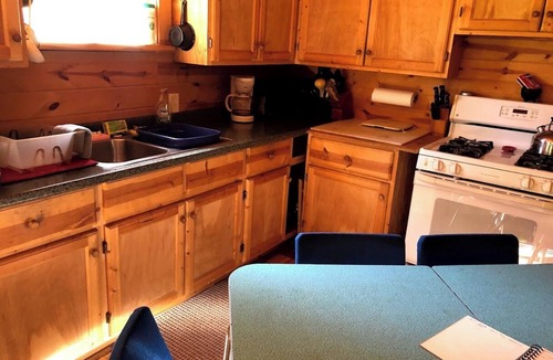 Skanee House | Welcoming off Grid 2-bedroom Cabin in Skanee. On the Big Huron River Fish camp!