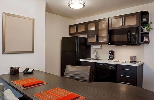 Southfield Hotel | Your Home Away From Home! 2 Convenient Rooms w/Living Room Where You Can Relax