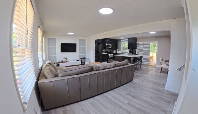 3-bedroom 2 Bath house in soothing Riverdale with AC and screened patio deck.