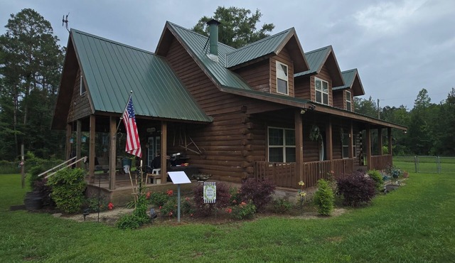 3-bedroom log cabin backs up to wooded lot for maximum peace and quiet!