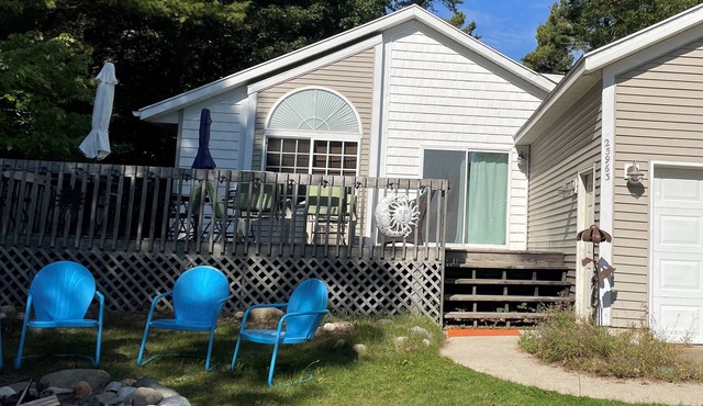 ALL DECKED OUT is a fun, bright, and beautiful home in town.