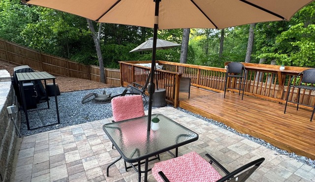 Backyard event space with basement apartment with kitchen, fitness room.