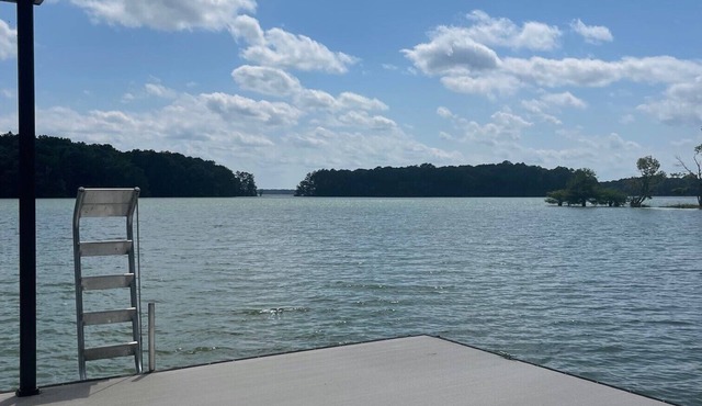 Beautiful luxury lake front home with private dock and outdoor fireplace
