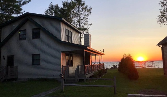 Black Lake sunset waterfront home 78' private sandy beach on prestine Black Lake