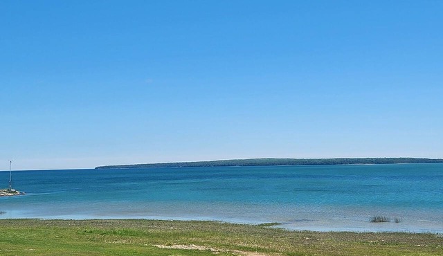 "Bluewater Beach" 5th wheel camper in Fairport - 435' of Lake Michigan shoreline