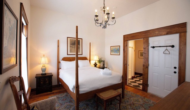 Charming historic stay in the heart of Sturgeon Bay! This studio retreat offers a warm and oh-so-cozy four-post bed, walk-in shower, a smart TV, and steps from the waterfront, all the shops and festivals!