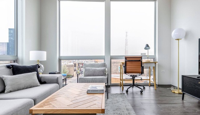 Charming Logan Square 2BR w/Gym, Roof Deck, 1 block to L, by Blueground in Chicago