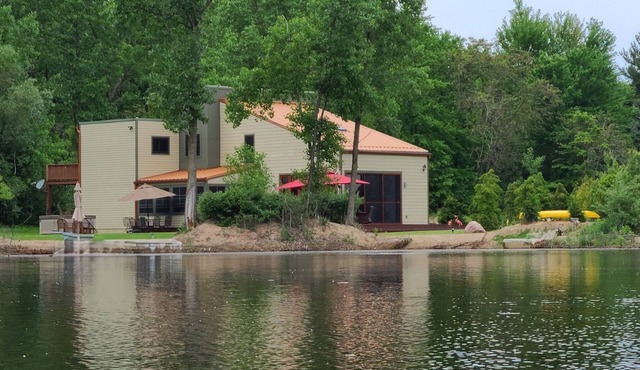 Contemporary home, 4 wooded acres, 200' lakefront; Dock; Backyard; Lake lounge