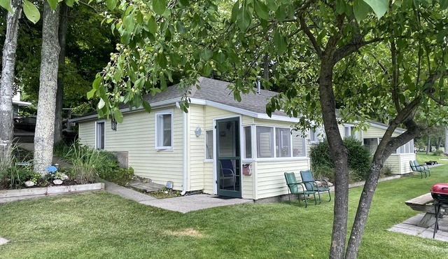Cottage 3 is a charming 2 bedroom 25’ from your boat dock & Hamlin lake.